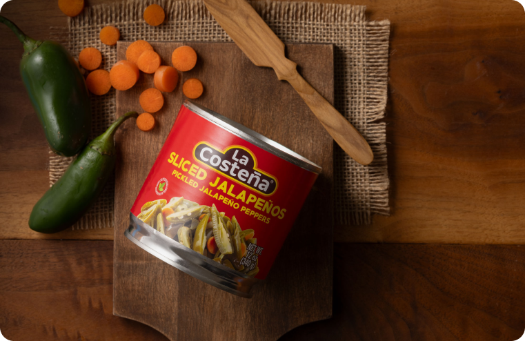 La Costeña jalapeño products on a wooden table