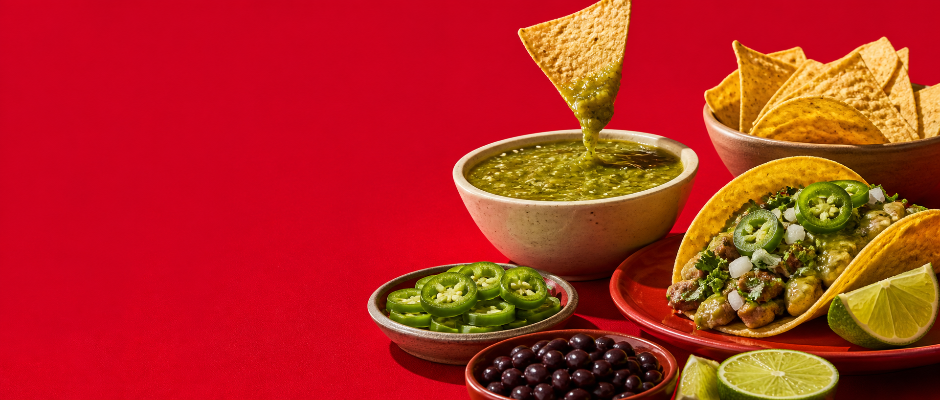 La Costeña tacos, salsa verde, jalapeños, and black beans